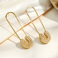 Gold geometric drop earrings with elongated paperclip-inspired design