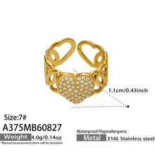 Size and measurement details for a gold heart cubic zirconia open ring in 316L stainless steel