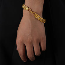 Gold 18K PVD stainless steel textured bracelet with lobster clasp on wrist, hypoallergenic and water-resistant, minimalist men's jewelry