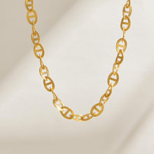 Gold-tone stainless steel mariner chain necklace displayed flat