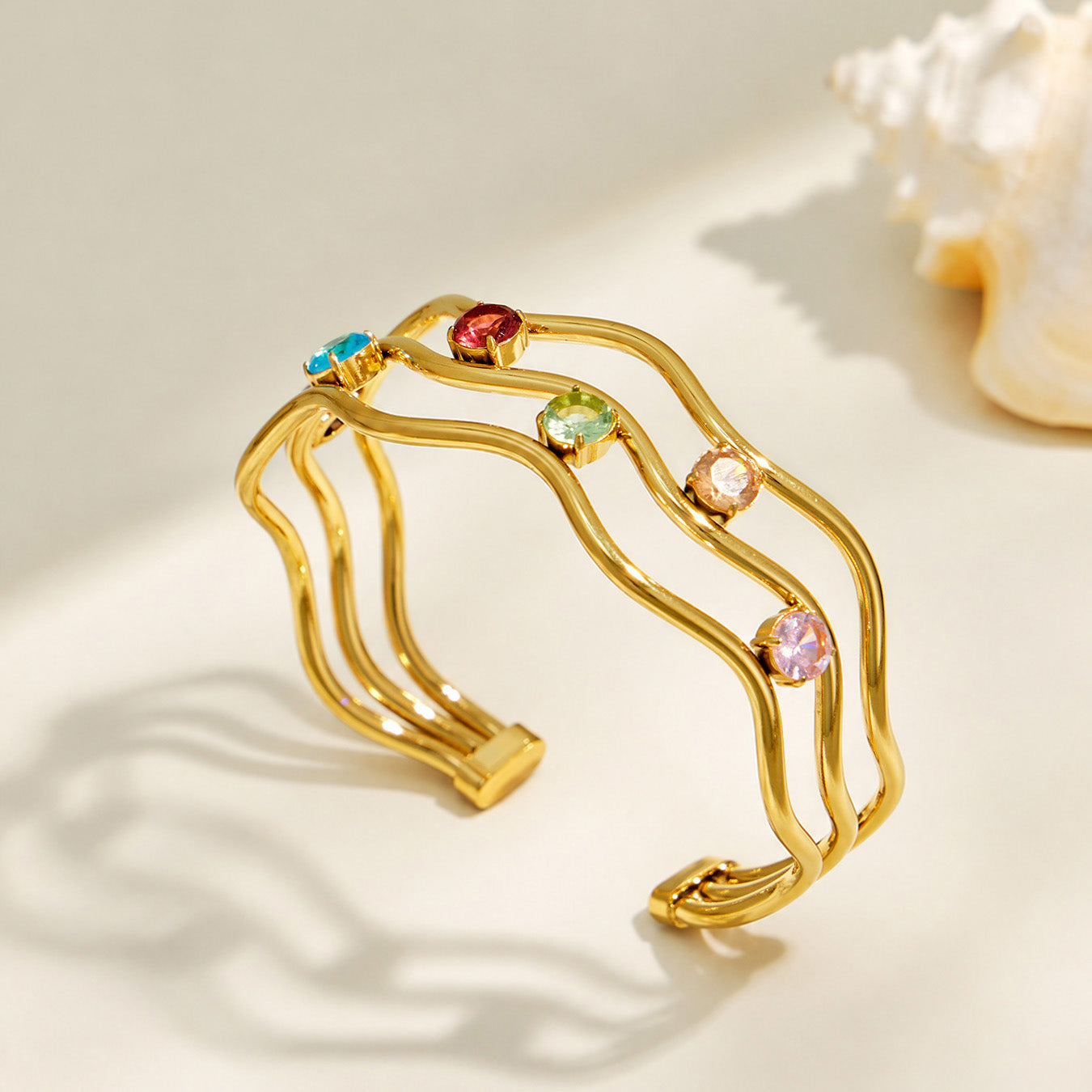 Gold three-layer open bangle with multicolor cubic zirconia accents
