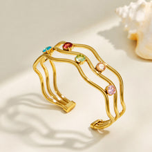 Gold three-layer open bangle with multicolor cubic zirconia accents