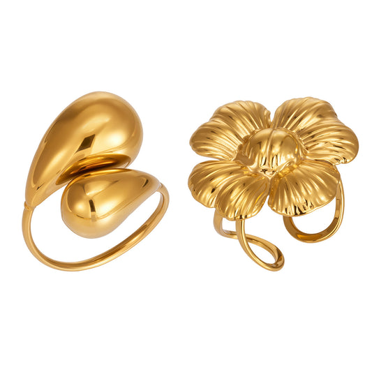 Gold open statement rings in 316L stainless steel featuring flower and teardrop designs for wholesale boutique jewelry