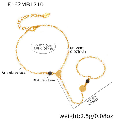 Gold 316L stainless steel pearl bracelet with cubic zirconia teddy bear charm detail