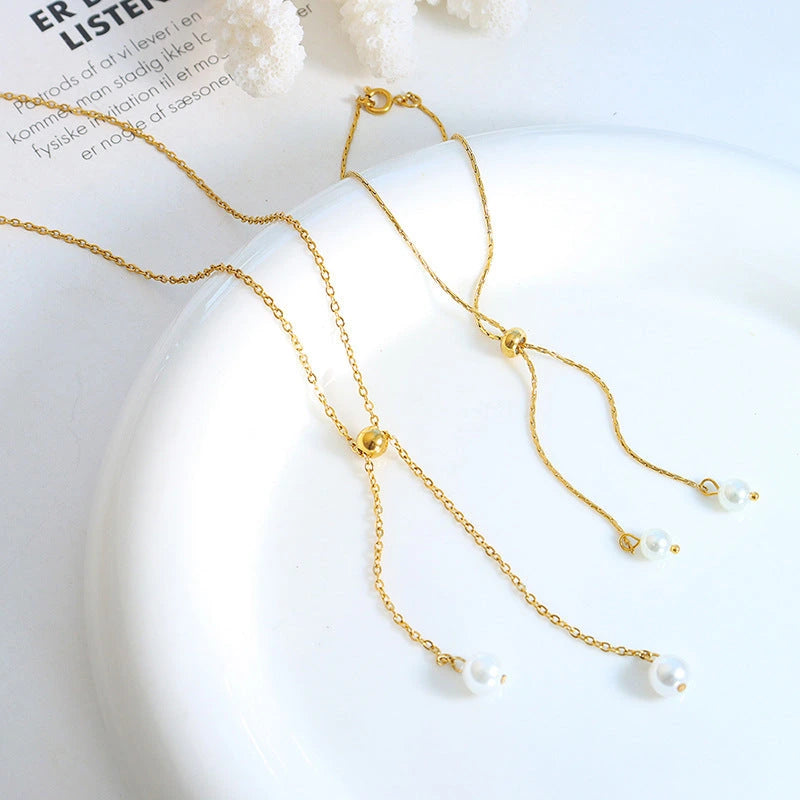 18K PVD gold pearl drop necklace and adjustable bracelet detail