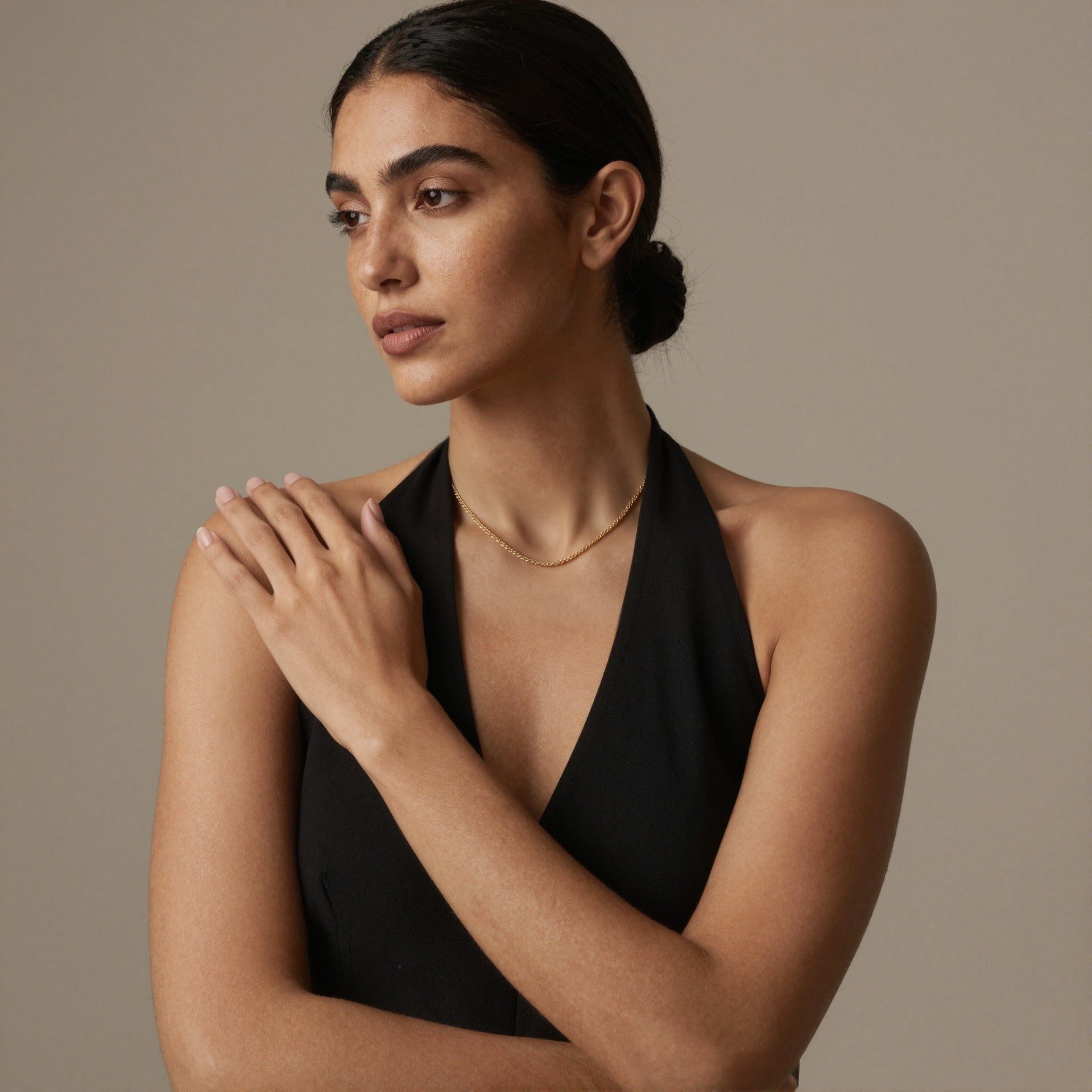 Minimalist gold rope chain necklace styled on model for everyday stainless steel chain jewelry assortments
