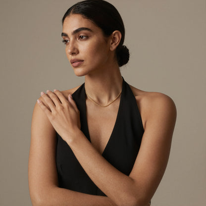 Minimalist gold rope chain necklace styled on model for everyday stainless steel chain jewelry assortments