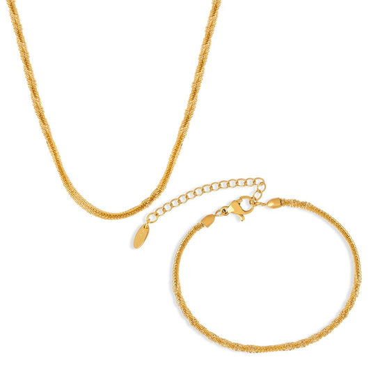 Model wearing gold rope chain necklace in stainless steel for minimalist boutique jewelry wholesale buyers