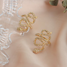 Gold snake statement ring with clear cubic zirconia product display