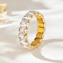 Gold-tone square faceted glass rhinestone stretch bracelet shown as a single product