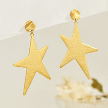 Pair of gold-tone stainless steel star drop earrings with textured geometric design