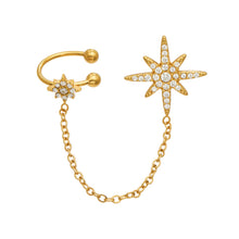 Gold-tone stainless steel chain ear cuff featuring a sparkling eight-point starburst, open cuff and connecting chain