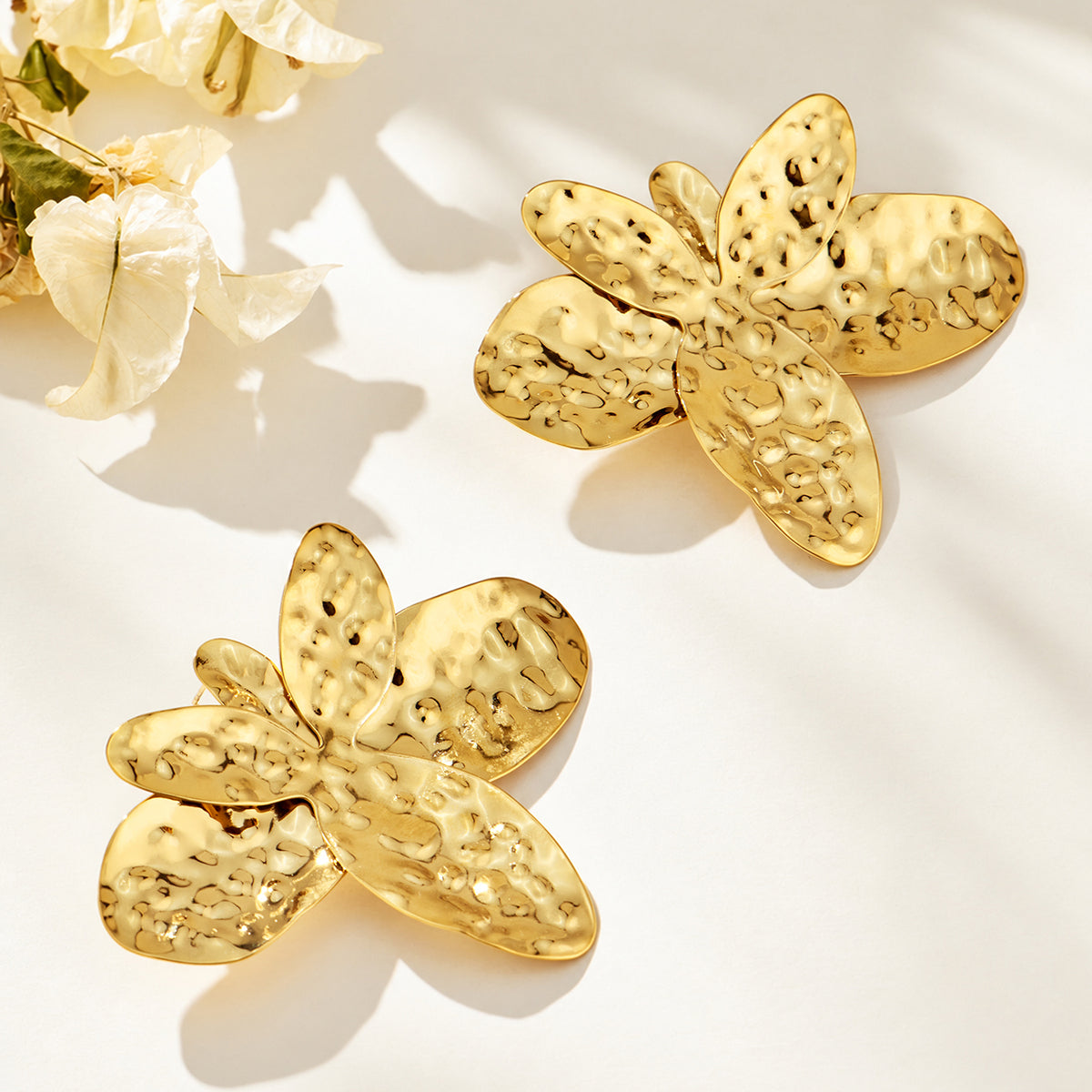 Pair of gold-tone stainless steel oversized hammered flower earrings