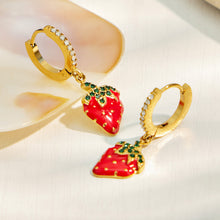 Pair of gold PVD strawberry charm huggie earrings with red and green fruit details