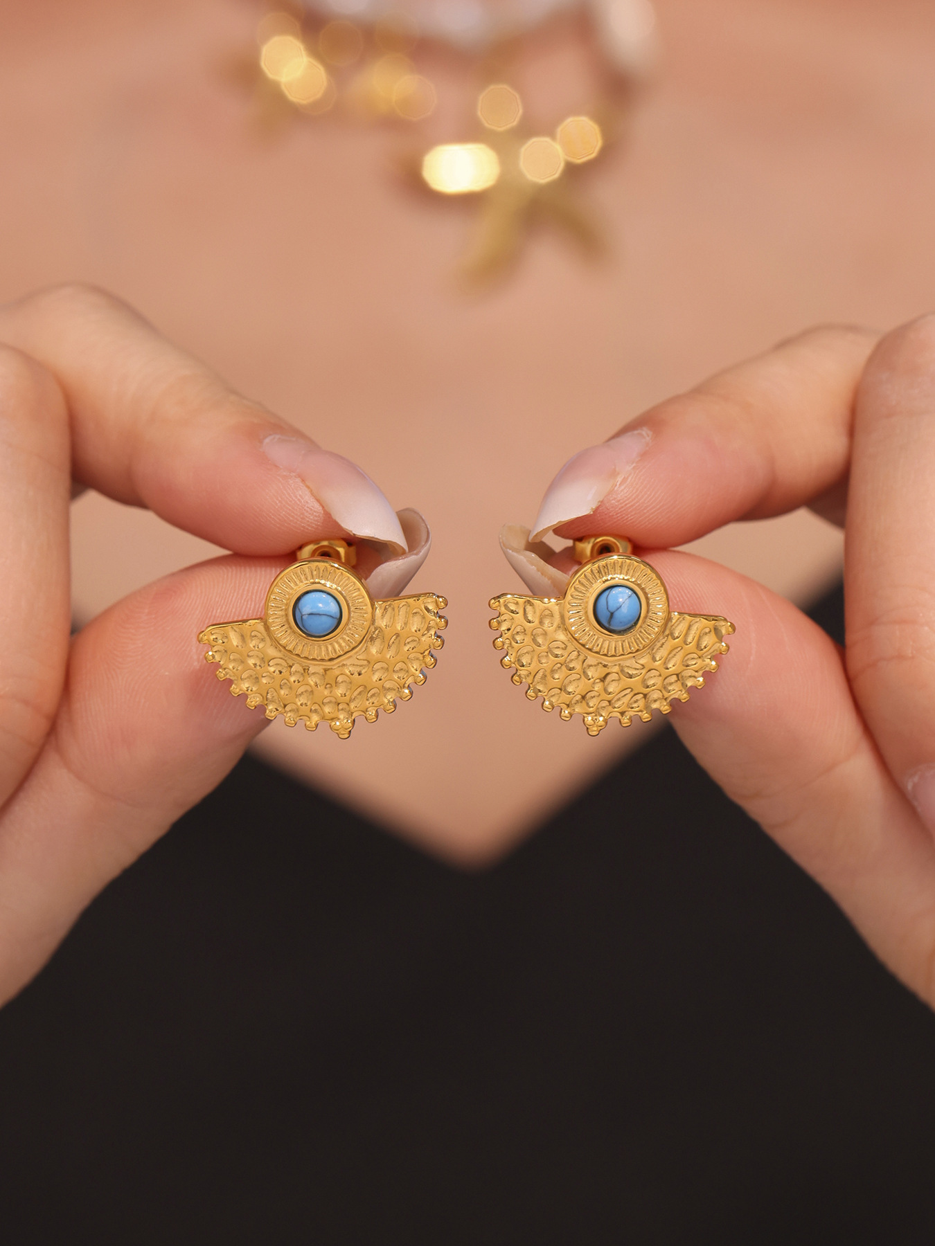 Front close-up of 18K PVD gold turquoise peacock fan stud earrings