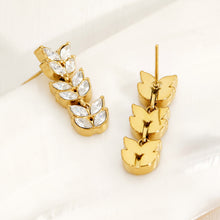 Front and back view of gold wheat motif cubic zirconia drop earrings