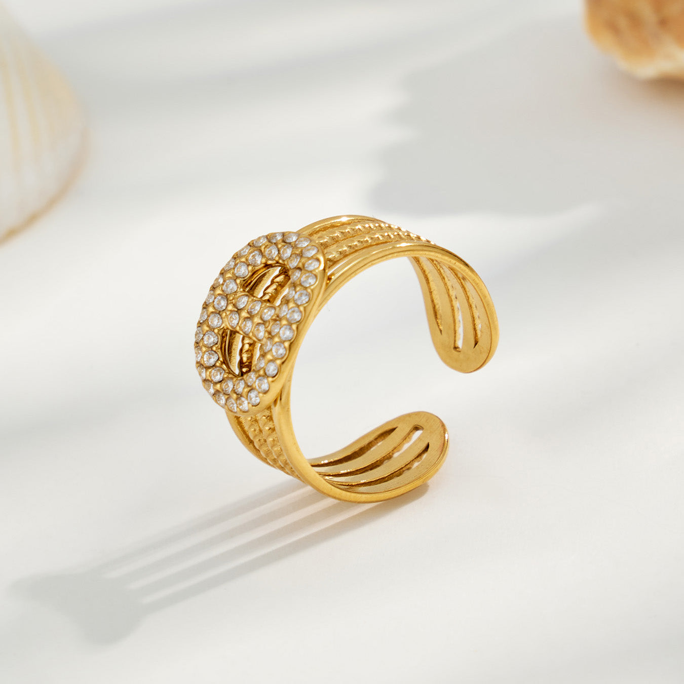 Gold wide band 316L stainless steel open ring with rows of sparkling cubic zirconia