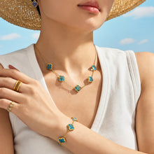 Gold zircon charm bracelet on model