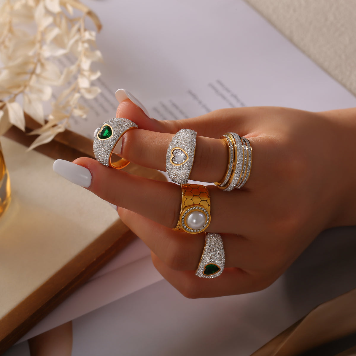 Gold zircon statement rings lifestyle styling