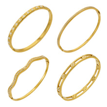 Four gold zircon stackable bangles in square, pavé, wave and flower designs