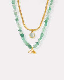 MiduoduoJewelry green beaded layered necklace with a gold chain, oval pendant and fan-shaped charm