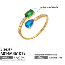A814 gold-tone stainless steel open ring with green and blue colored glass and white cubic zirconia