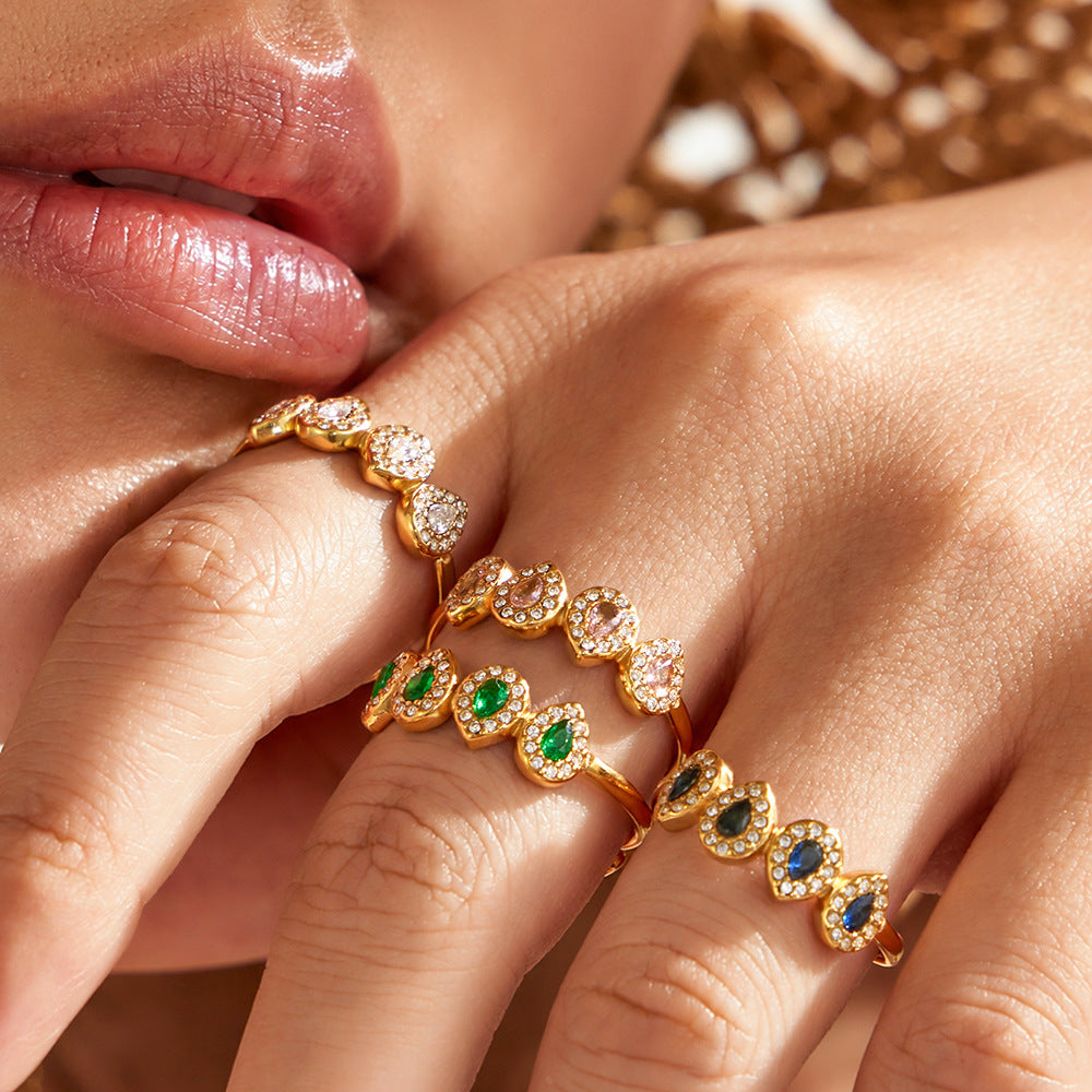 Model wearing colorful zircon ring with 18K PVD gold finish for women’s fashion jewelry styling