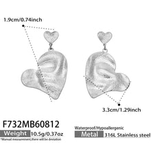 Close-up of Hammered Heart Stainless Steel Earrings
