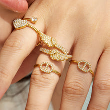 Elegant heart zircon gold ring on display