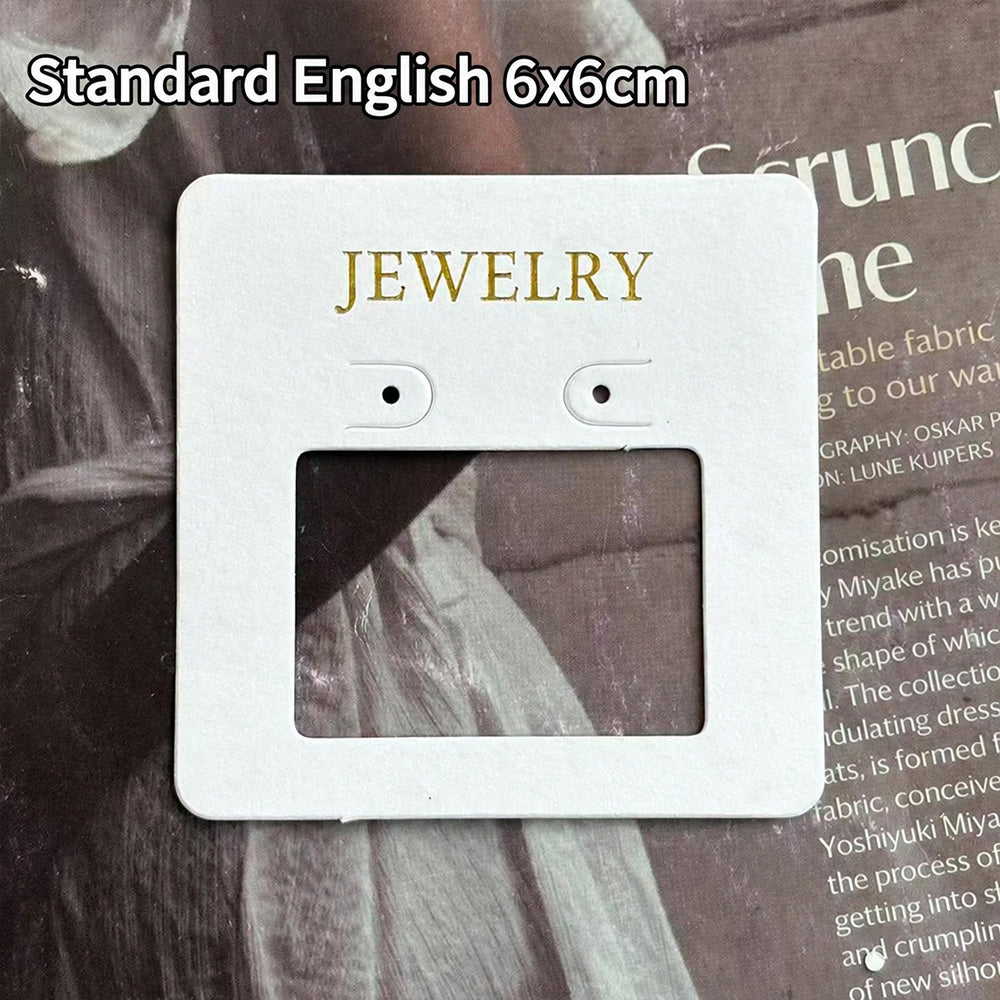 White 6 × 6 cm jewelry display card with window cutout and printed jewelry text