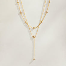 Layered gold PVD zircon necklaces with Y lariat pendant design
