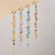 Long drop crystal earrings with geometric gemstone design