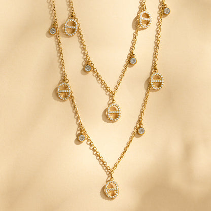 coordinated gold layered necklace and bracelet set for modern minimalist fashion style