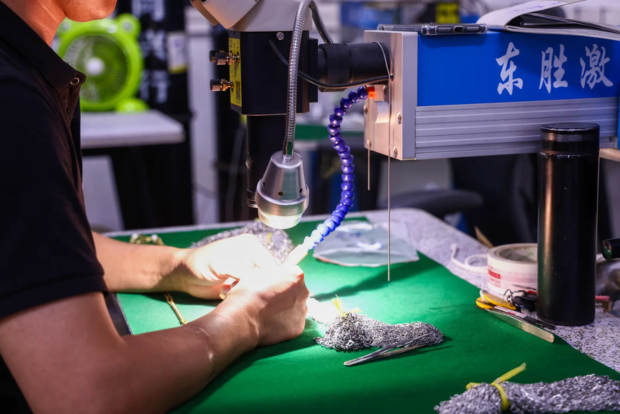 Operator working at a jewelry workbench