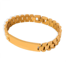 Men’s steel tone ID link bracelet on wrist with watch-band-style links and polished stainless steel finish