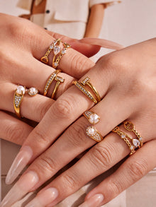 Model wearing micro pave zircon open rings in a stackable ring look for boutique jewelry styling