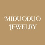 Miduoduo Jewelry white wordmark on a warm gold background