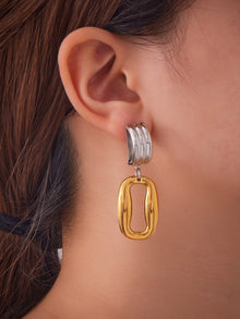 Miduoduo two-tone hollow rectangle door knocker earrings worn by model
