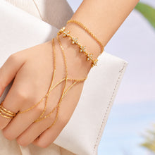 Gold zircon hand chain bracelet stacked with butterfly zircon bracelet on wrist, summer hand jewelry styling by Miduoduo Jewelry