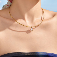 Minimal gold chain necklace on model