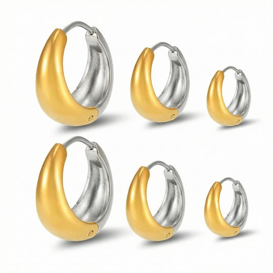 High-polished two-tone teardrop huggie hoop earrings in three different sizes, featuring a mixed metal design of silver stainless steel and gold plating.