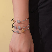 model wearing multi-color shell diamond cuff bracelets, stacked style, casual fashion accessory