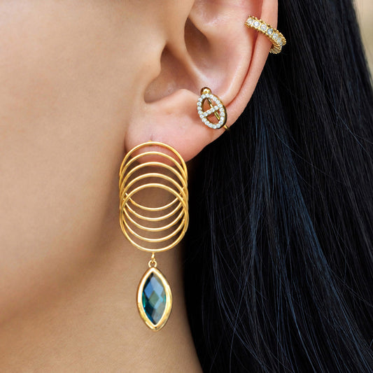Elegant white glass stone earring with gold accents