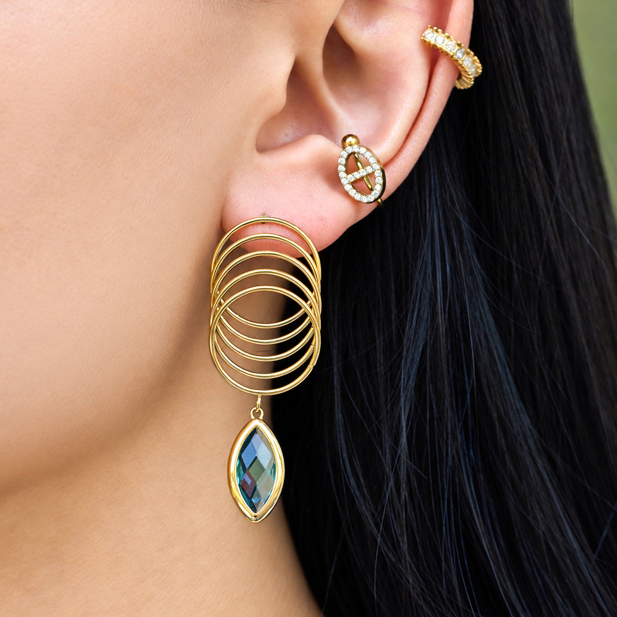Stunning green glass stone earring with gold finish