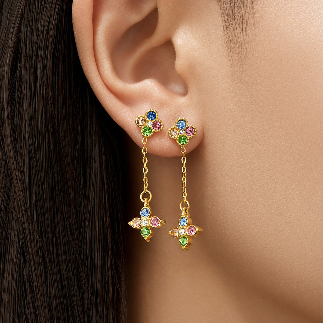 Model wearing multicolor cubic zirconia clover drop earrings