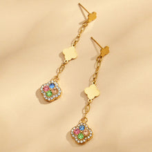 Gold four leaf clover drop earrings with multicolor crystal pavé details