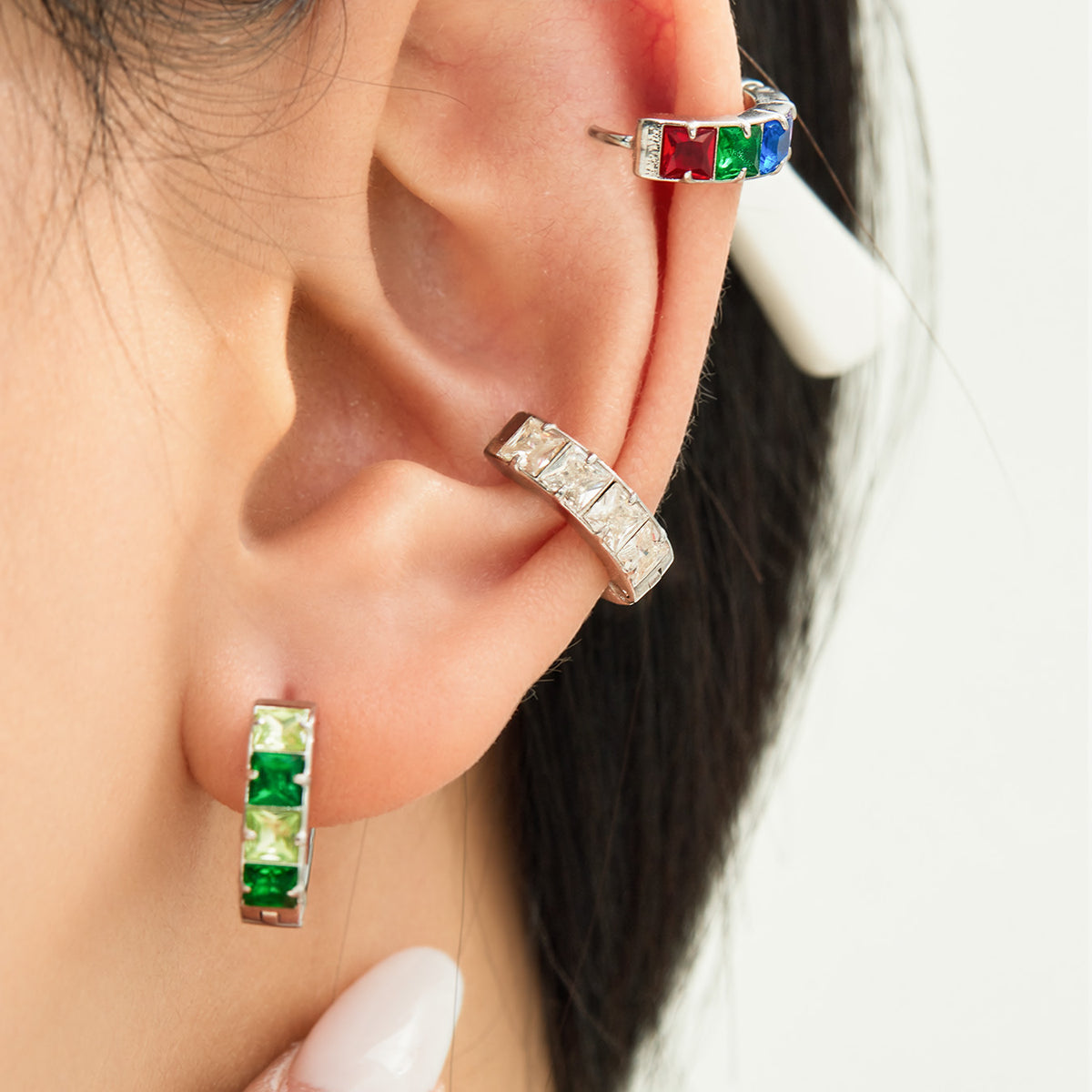 Multicolor CZ stainless steel hoop earrings worn for everyday styling