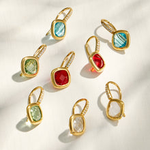 Collection of colorful glass stone drop earrings in multiple jewel-tone colors