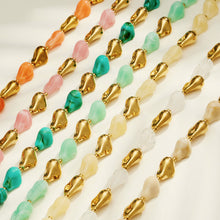Rows of colorful resin necklace and bracelet designs showing multiple organic bead color options