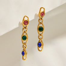 Multicolor zircon drop earrings flat lay